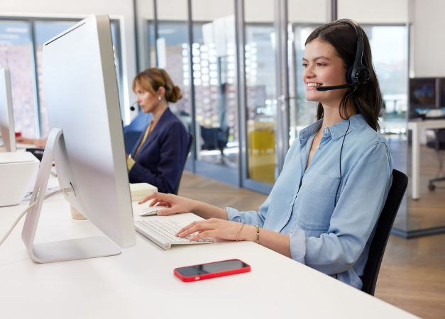 Customer Service employee talking on the phone