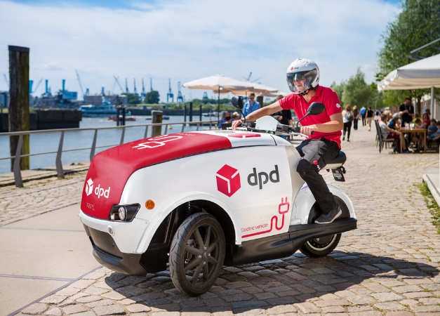 DPD driver riding a delivery trycicle